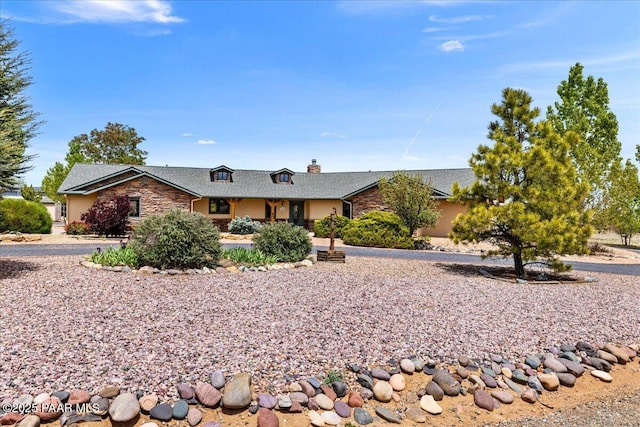 1640 W Grasshopper Ln, Chino Valley, AZ 86323 - ranch-style home with a chimney, stone siding, and a shingled roof