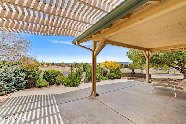1640 W Grasshopper Ln, Chino Valley, AZ 86323 - view of patio with fence and a pergola