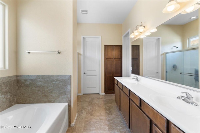 13058 E Acosta St, Dewey-Humboldt, AZ 86327 - full bathroom with a bath, double vanity, and a stall shower