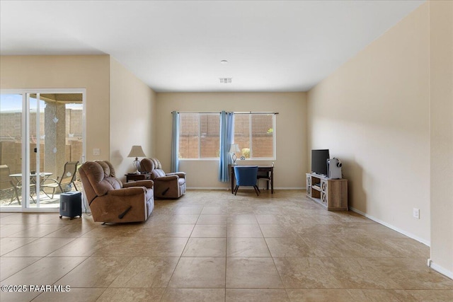13058 E Acosta St, Dewey-Humboldt, AZ 86327 - tiled living room featuring baseboards