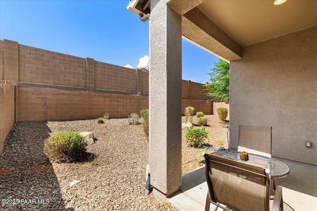 13058 E Acosta St, Dewey-Humboldt, AZ 86327 - fenced backyard featuring a patio area