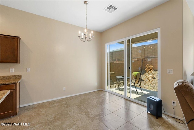 13058 E Acosta St, Dewey-Humboldt, AZ 86327 - dining room with a chandelier and baseboards
