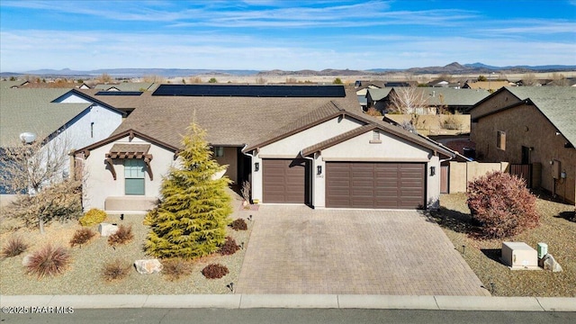 ranch-style home featuring a mountain view