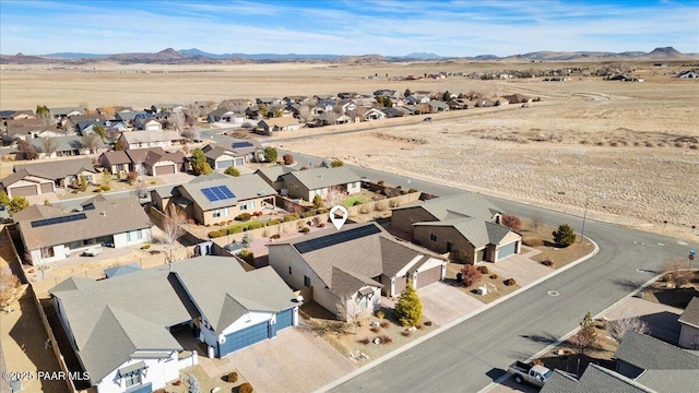 drone / aerial view featuring a mountain view