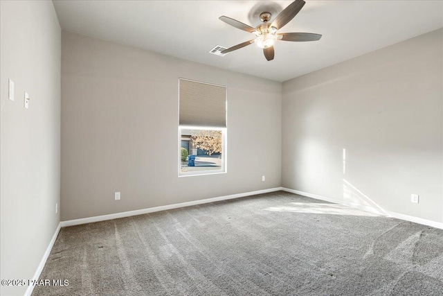 carpeted empty room with ceiling fan