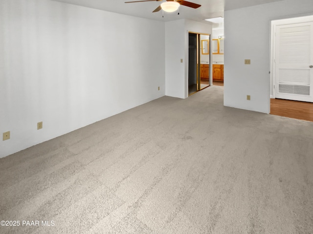 410 Apache Plume Trl, Prescott, AZ 86301 - unfurnished bedroom with carpet flooring, ensuite bathroom, and a ceiling fan