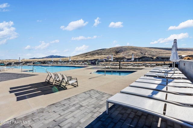 view of pool with a mountain view