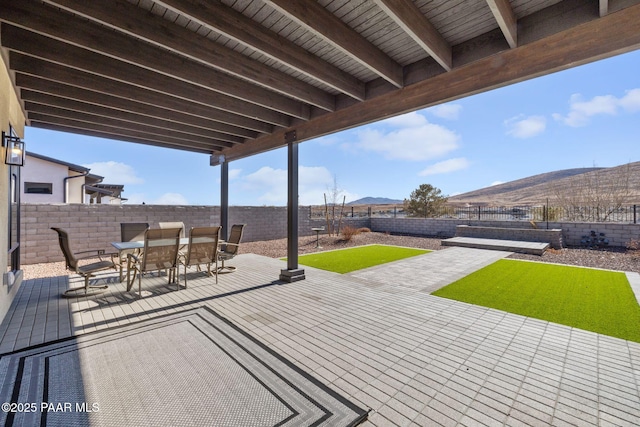 view of patio / terrace with a mountain view