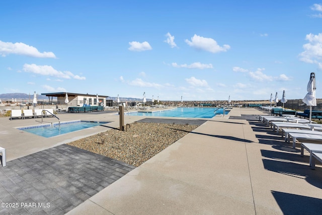 view of pool featuring a patio