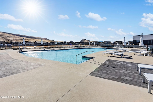 view of swimming pool featuring a patio