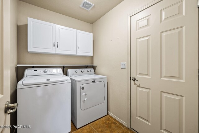 25870 N Merlot Ln, Paulden, AZ 86334 - laundry room with washing machine and dryer, cabinet space, dark tile patterned flooring, and baseboards
