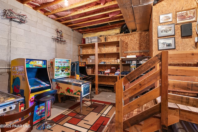 interior space featuring concrete block wall