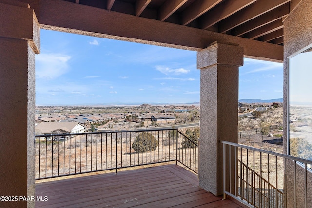 wooden terrace with a mountain view