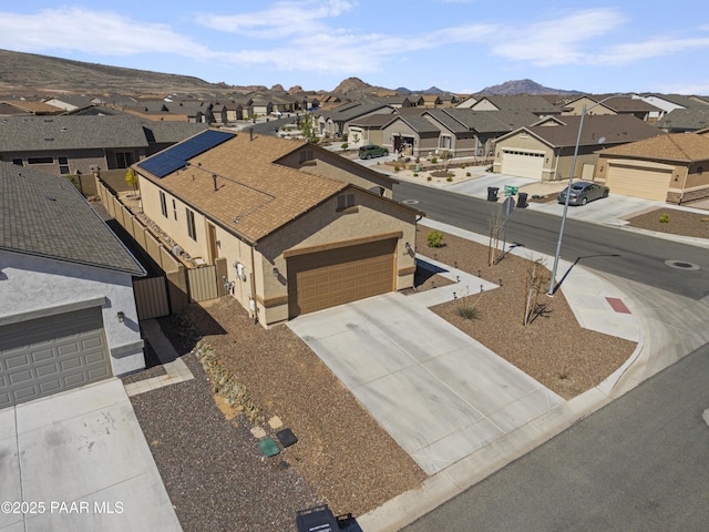 bird's eye view featuring a residential view and a mountain view