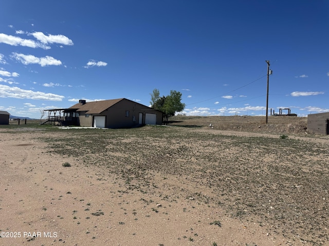3125 W Big Chino Rd, Paulden, AZ 86334 - view of yard featuring a garage