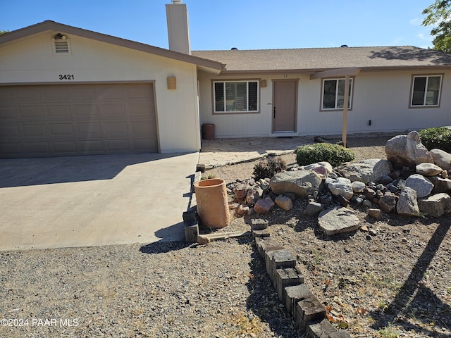 ranch-style house with a garage