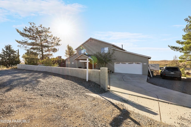 view of front of home with a garage