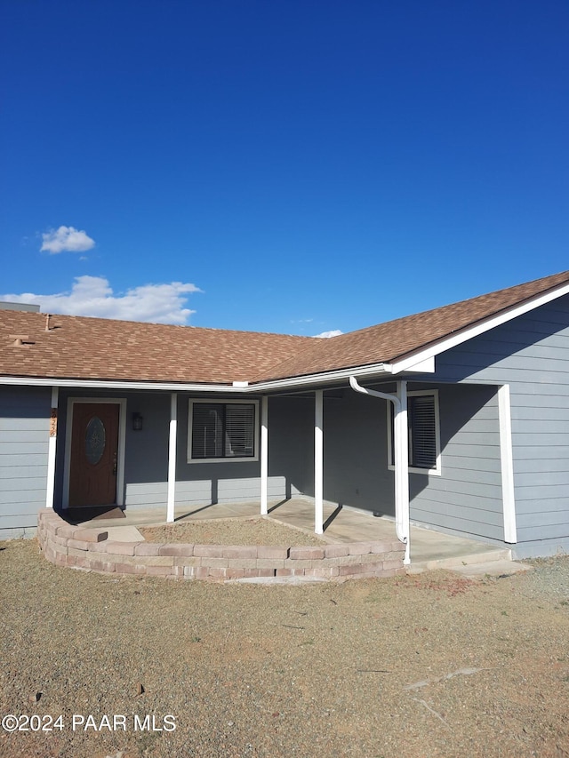 ranch-style house with a front yard