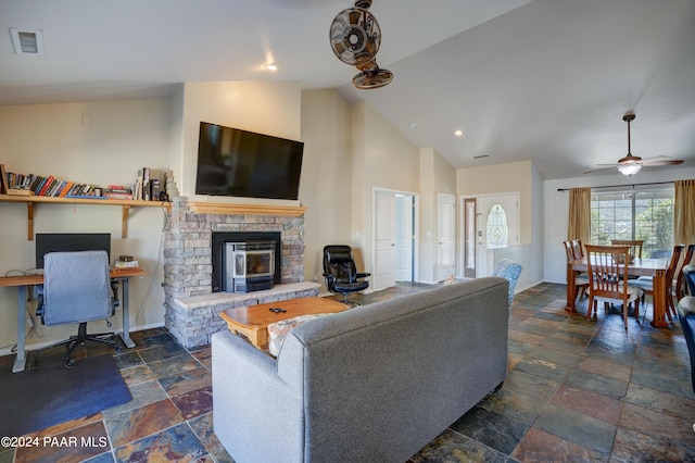 living room with ceiling fan and lofted ceiling