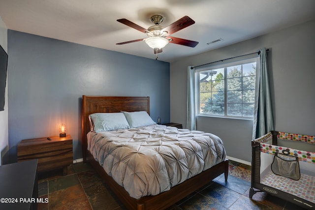 bedroom featuring ceiling fan