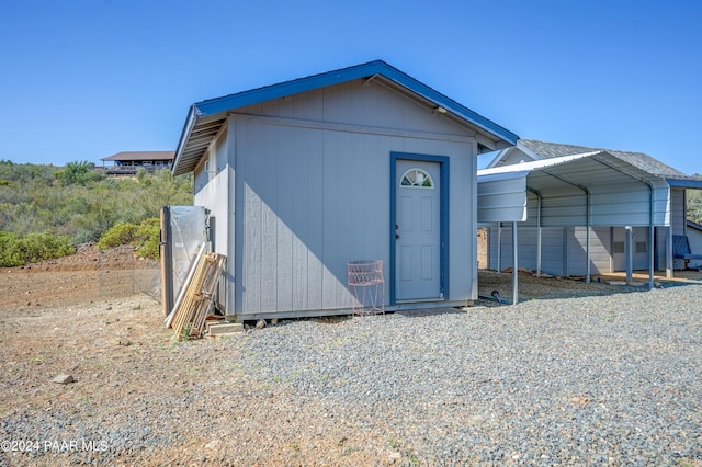 view of outdoor structure featuring a carport