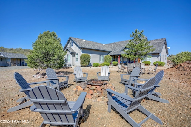 view of patio / terrace with an outdoor fire pit