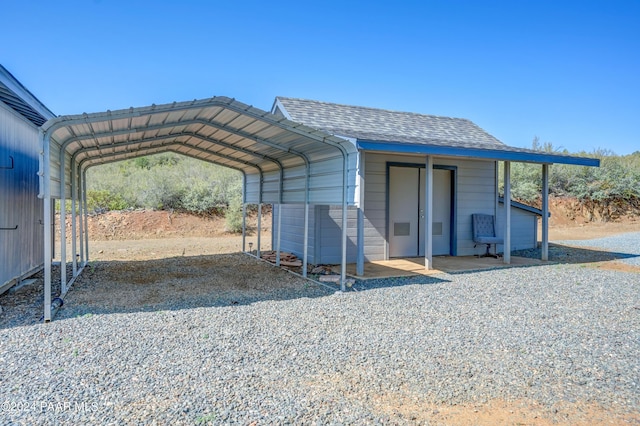 view of vehicle parking with a carport