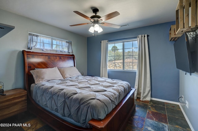 bedroom featuring ceiling fan