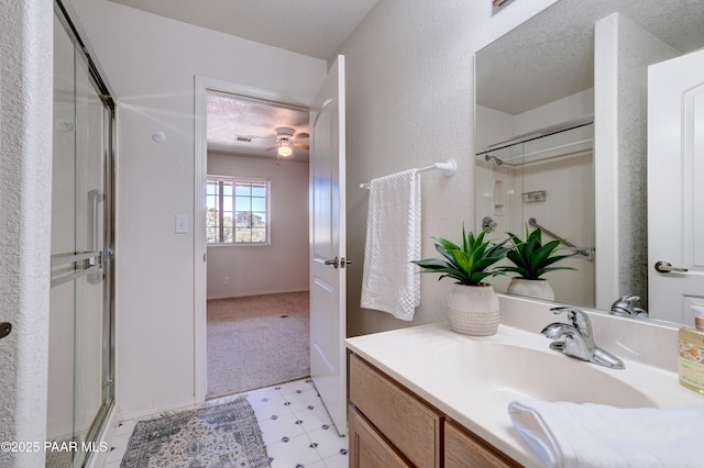 2785 W Bard Ranch Rd, Prescott, AZ 86305 - bathroom featuring a stall shower, vanity, tile patterned floors, and ceiling fan