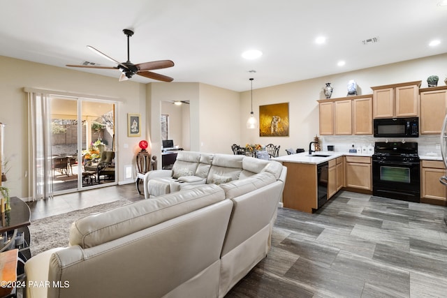 living room featuring ceiling fan