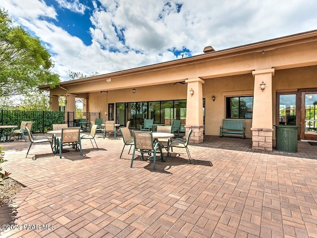 view of patio featuring ceiling fan