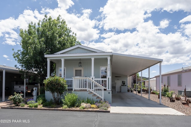 11250 E State Route 69, Dewey-Humboldt, AZ 86327 - view of front of house with an attached carport and driveway