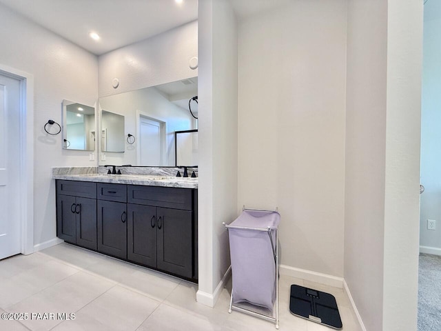 5744 E Killen Loop, Prescott Valley, AZ 86314 - full bathroom featuring double vanity, baseboards, tile patterned flooring, and recessed lighting