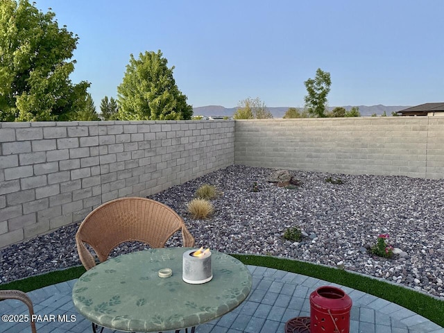 5744 E Killen Loop, Prescott Valley, AZ 86314 - fenced backyard with a patio area and outdoor dining area