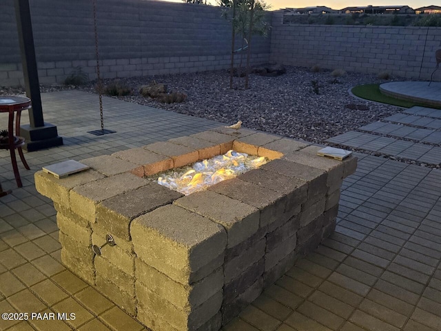 5744 E Killen Loop, Prescott Valley, AZ 86314 - fenced backyard with a fire pit and a patio