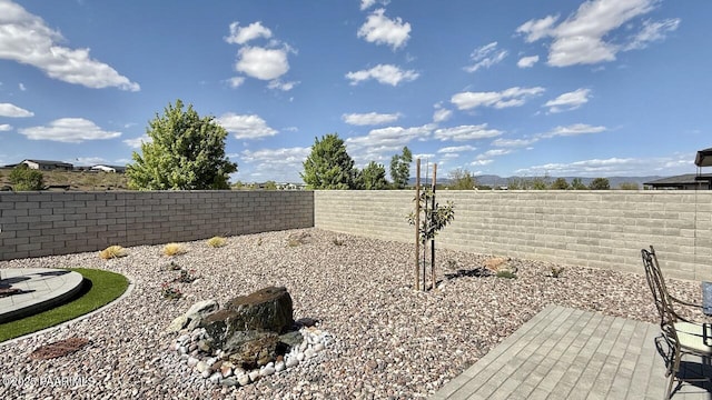 5744 E Killen Loop, Prescott Valley, AZ 86314 - fenced backyard with a patio
