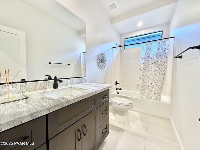 5744 E Killen Loop, Prescott Valley, AZ 86314 - full bathroom with tile patterned flooring, toilet, shower / bath combination with curtain, and vanity