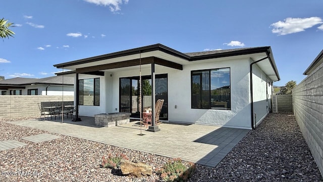 5744 E Killen Loop, Prescott Valley, AZ 86314 - rear view of house with a patio area, stucco siding, and a fenced backyard
