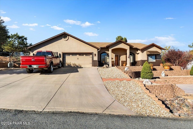 ranch-style house with a garage