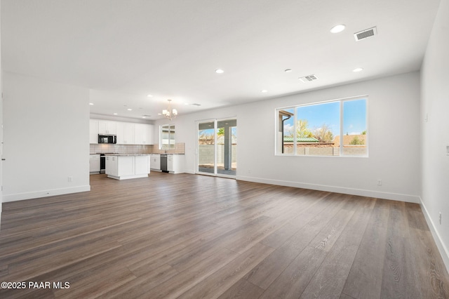 7480 E Louie Ln, Prescott Valley, AZ 86315 - modern home featuring board and batten siding, a garage, decorative driveway, fence, and stucco siding