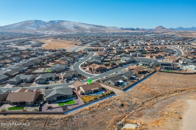 drone / aerial view featuring a mountain view