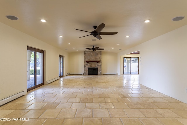 unfurnished living room featuring a baseboard heating unit, a stone fireplace, and a ceiling fan