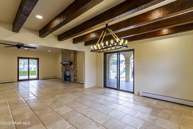 spare room featuring a baseboard radiator, a fireplace, baseboard heating, and beamed ceiling