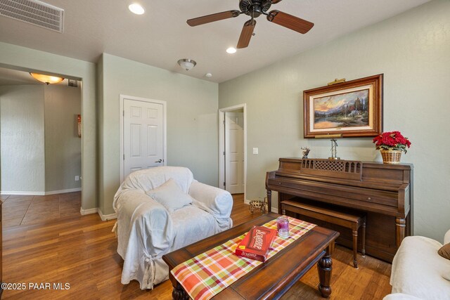 1109 N Half Hitch Rd, Prescott Valley, AZ 86314 - living room with a ceiling fan, wood finished floors, recessed lighting, and baseboards