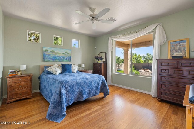 1109 N Half Hitch Rd, Prescott Valley, AZ 86314 - bedroom with baseboards, light wood-type flooring, and ceiling fan