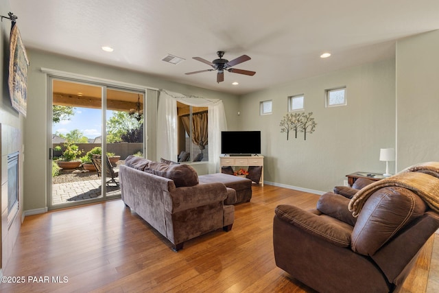 1109 N Half Hitch Rd, Prescott Valley, AZ 86314 - living room featuring healthy amount of natural light, ceiling fan, wood finished floors, recessed lighting, and baseboards