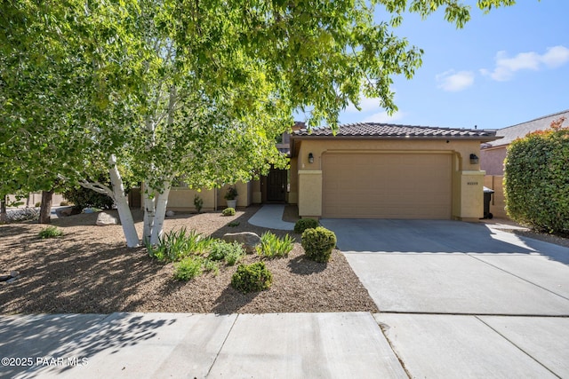 1109 N Half Hitch Rd, Prescott Valley, AZ 86314 - view of front of property featuring stucco siding, an attached garage, concrete driveway, and a tile roof