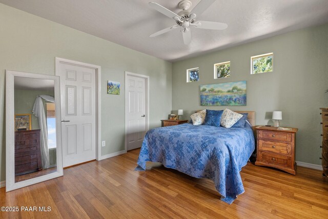 1109 N Half Hitch Rd, Prescott Valley, AZ 86314 - bedroom featuring wood finished floors, baseboards, and a ceiling fan