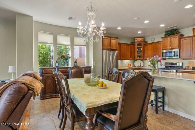 1109 N Half Hitch Rd, Prescott Valley, AZ 86314 - dining room featuring recessed lighting, light tile patterned floors, and a chandelier