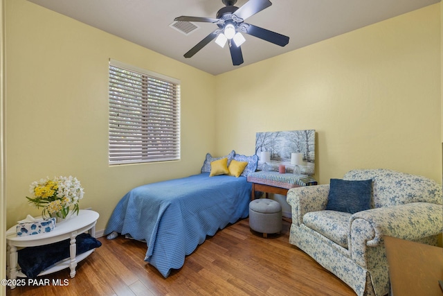 1109 N Half Hitch Rd, Prescott Valley, AZ 86314 - bedroom with wood finished floors, a ceiling fan, and baseboards